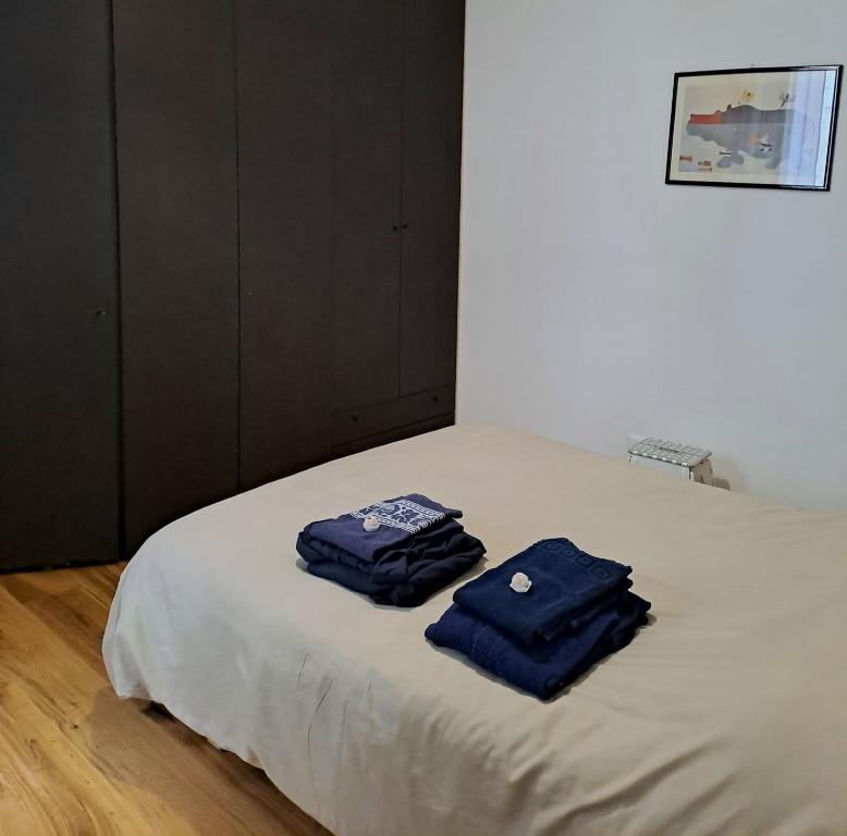 Postel nebo postele na pokoji v ubytování Genoa Waterfront Room