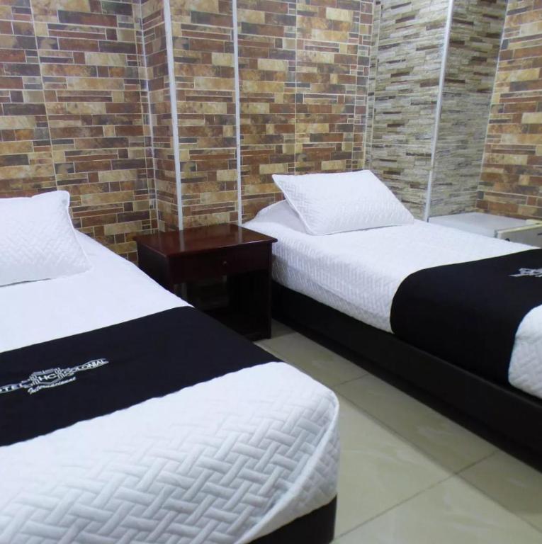 Postel nebo postele na pokoji v ubytování Hotel Colonial Internacional