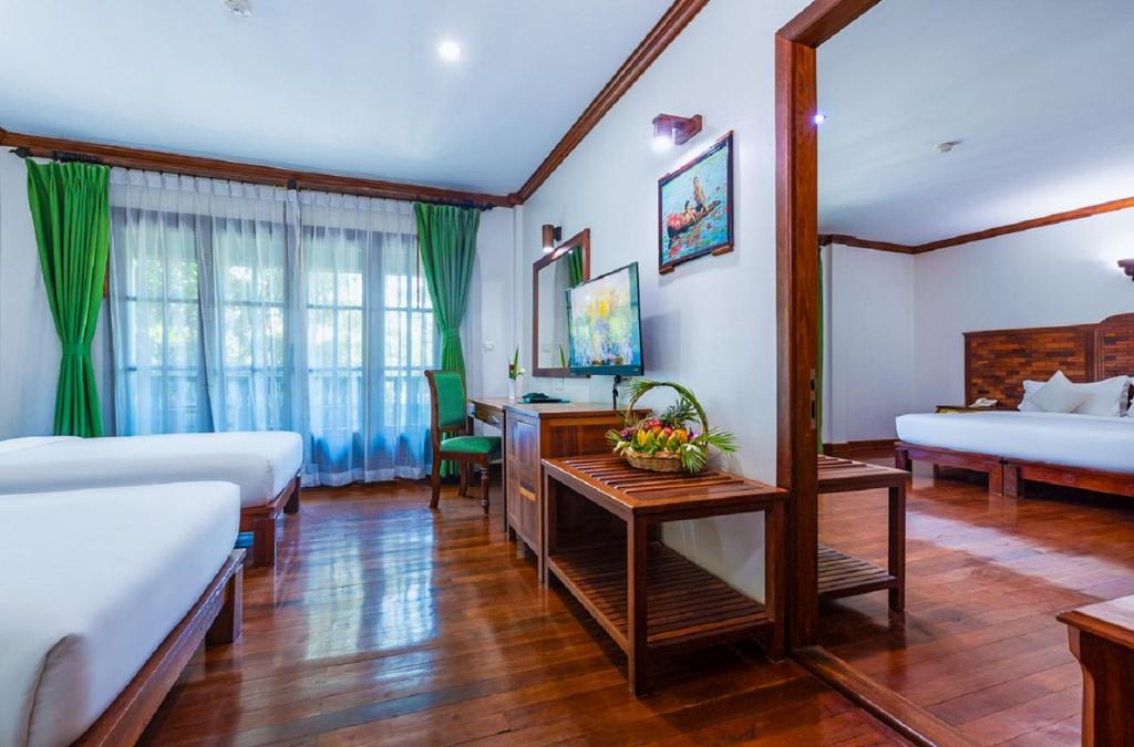 Postel nebo postele na pokoji v ubytování Pierre Hotel