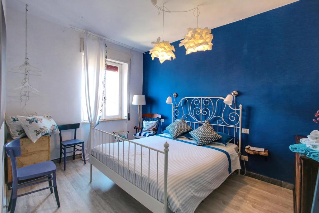 Un pat sau paturi într-o cameră la Your seaside flat