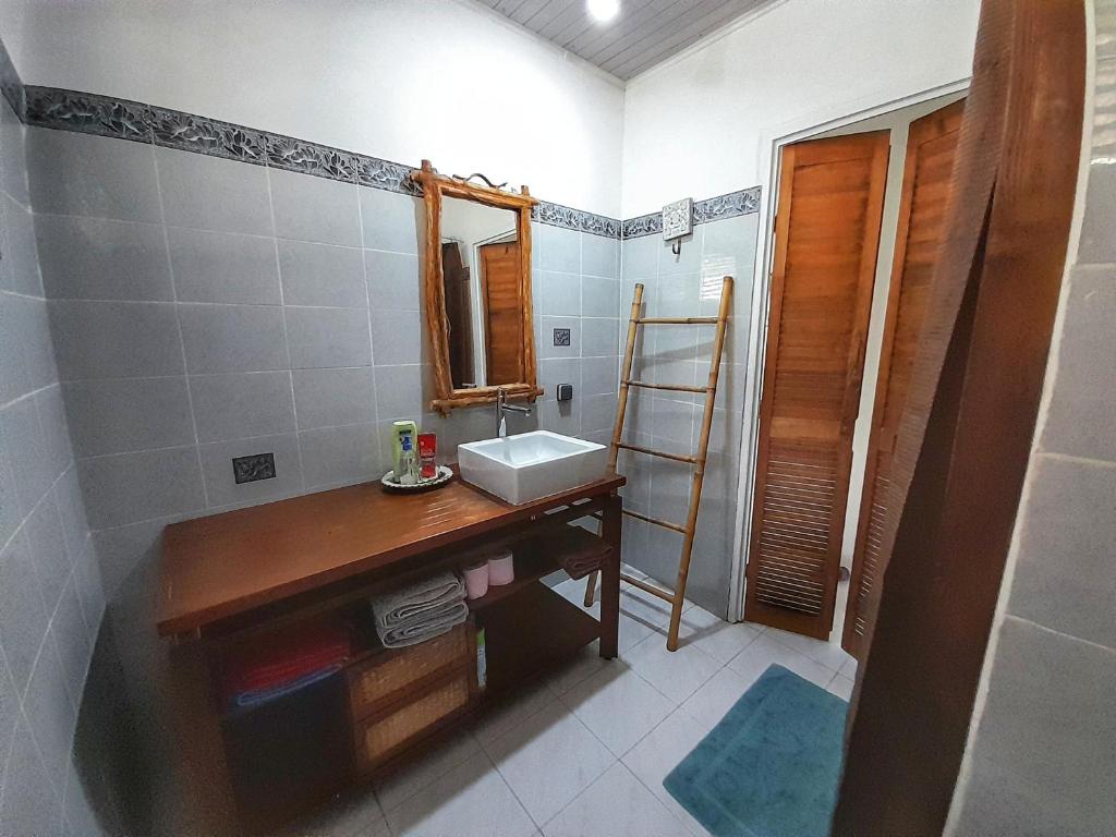 Koupelna v ubytování Appartement Papay dans Villa Fleurs des Iles