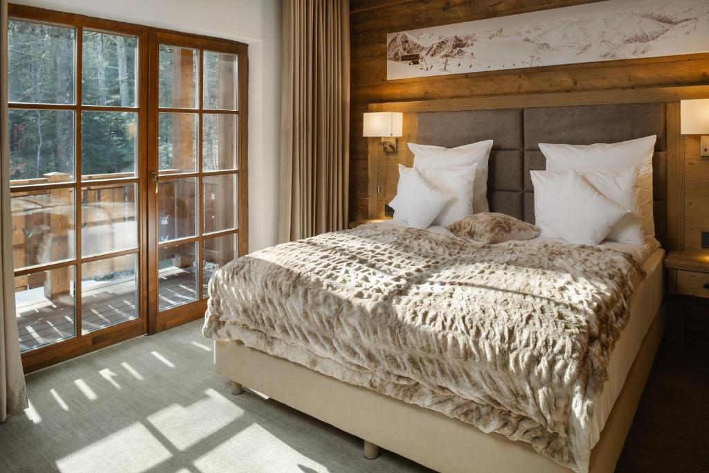 Postel nebo postele na pokoji v ubytování Chalet Royal