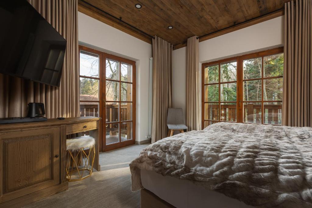 TV a/nebo společenská místnost v ubytování Chalet Royal