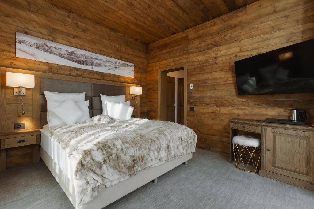 Postel nebo postele na pokoji v ubytování Chalet Royal
