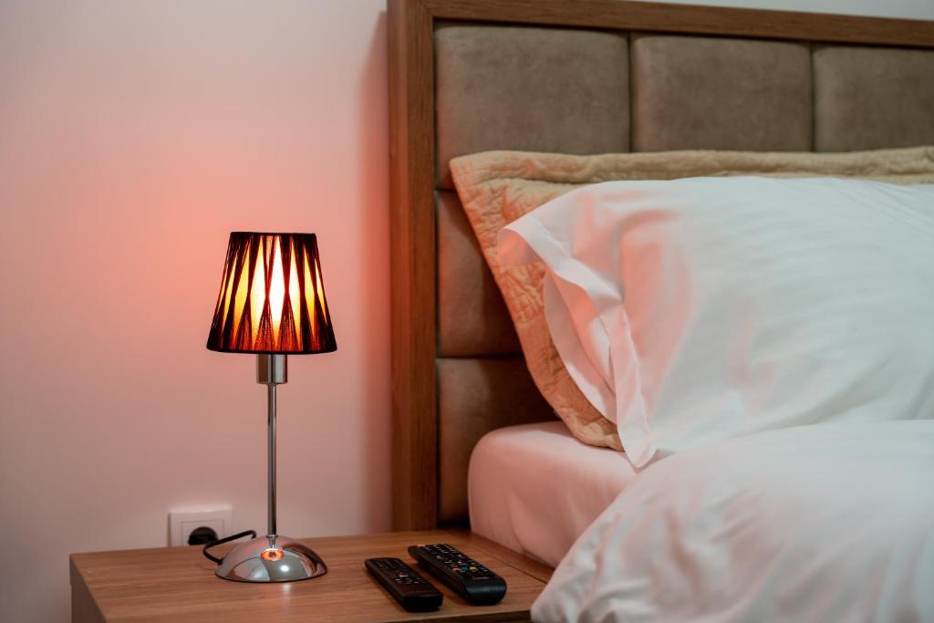 Ein Bett oder Betten in einem Zimmer der Unterkunft Royal Apartman