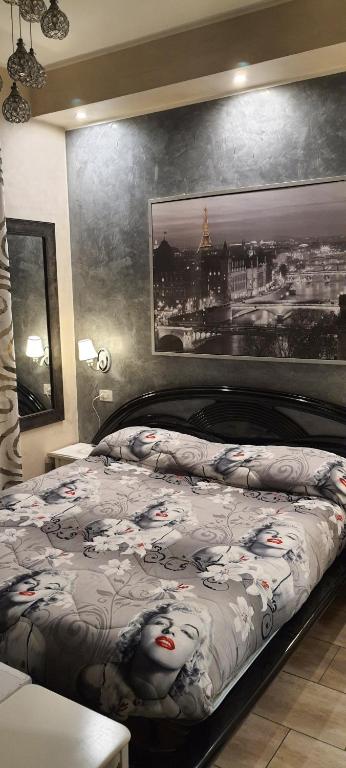 A bed or beds in a room at Max B&B Fiera