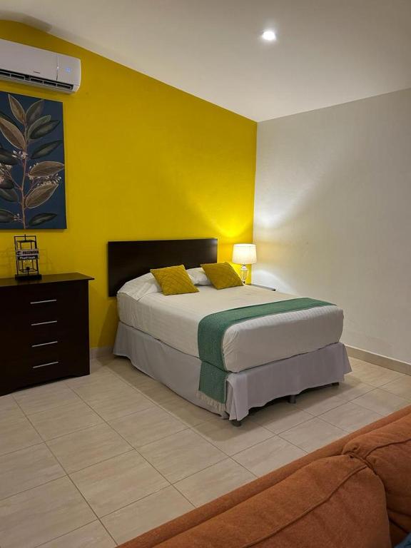 Cama o camas de una habitación en Hotel Boutique Victoria