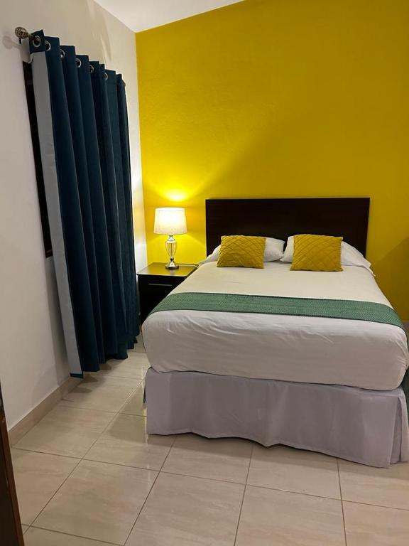 Cama o camas de una habitación en Hotel Boutique Victoria