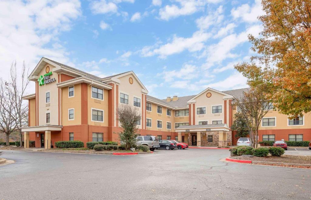 a rendering of a hotel with a parking lot at Extended Stay America Suites - Memphis - Germantown West in Memphis