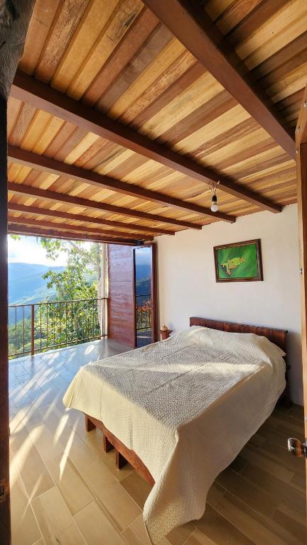 Postel nebo postele na pokoji v ubytování Cabaña Vista de Oro 1