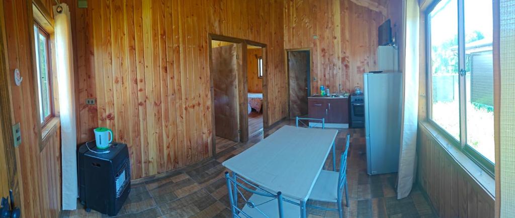 Kuchyň nebo kuchyňský kout v ubytování Cabaña Queule Costero