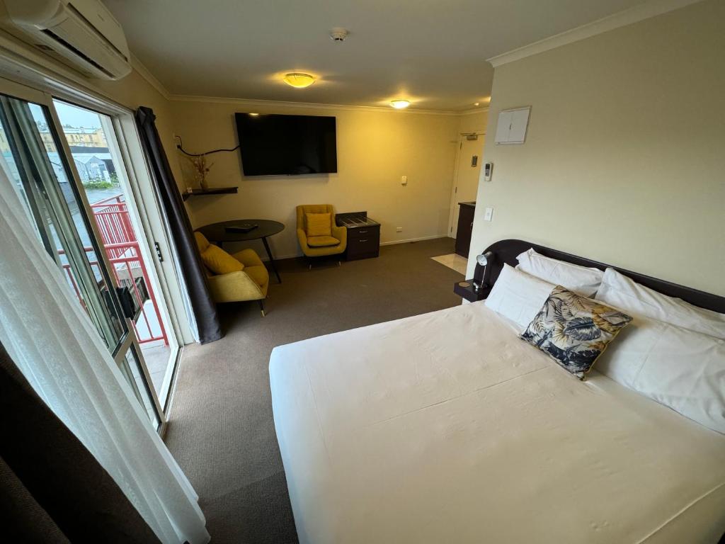 Postel nebo postele na pokoji v ubytování B-Ks Premier Motel Palmerston North