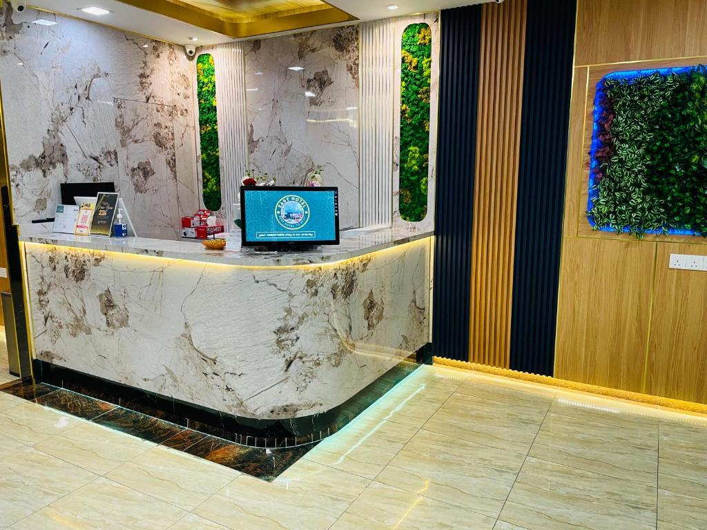 TV a/nebo společenská místnost v ubytování ESSY Hotel KL Sentral
