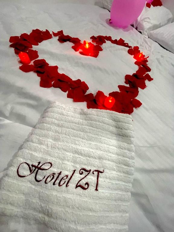 Postel nebo postele na pokoji v ubytování Hotel ZT