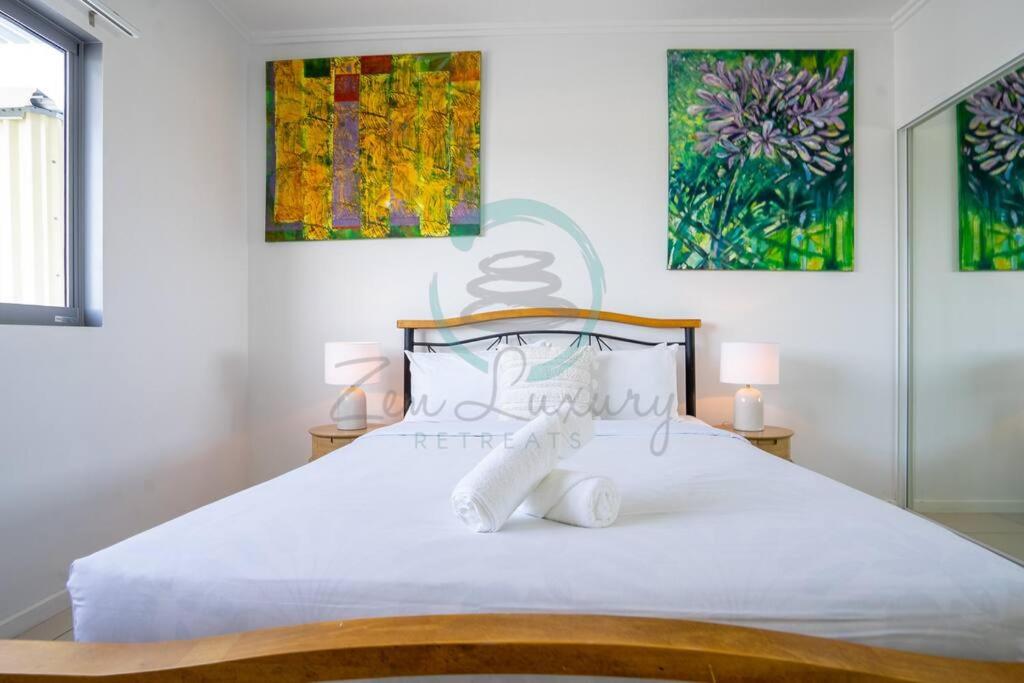 Katil atau katil-katil dalam bilik di Zen at Mitchell - Unique 2-BR Rooftop Apt in CBD