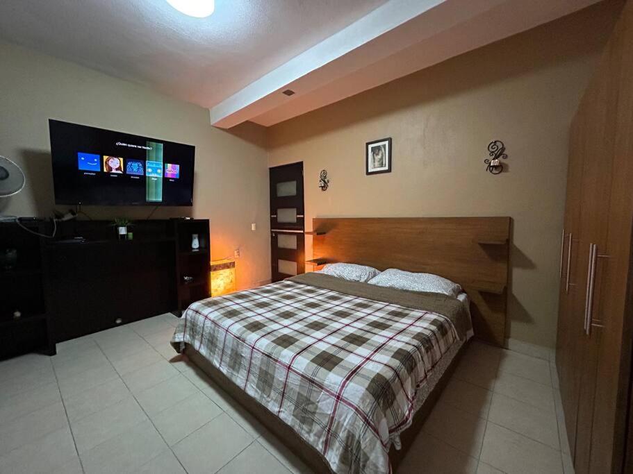 Кровать или кровати в номере La Casita del zomat