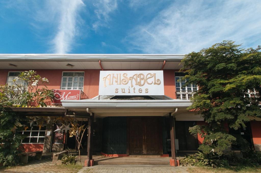 Ein Gebäude mit einem Schild, das Diebesbisse liest. in der Unterkunft RedDoorz Premium at Anisabel Suites Davao City in Davao City