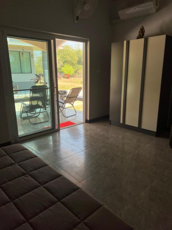 Posezení v ubytování Chambre d'hôte chez Pat - Thailande authentique