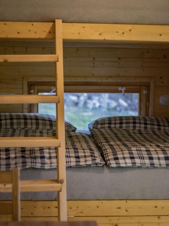 Postel nebo postele na pokoji v ubytování Maringotky Na Růžku
