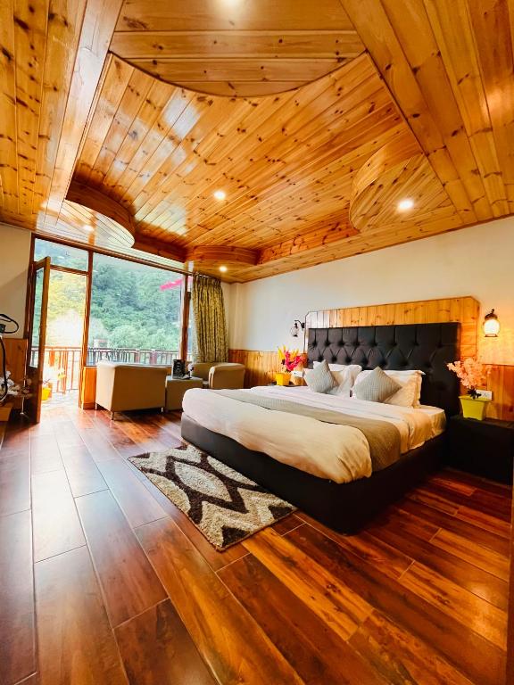 Postel nebo postele na pokoji v ubytování Hotel Himalayan Classic, Manali