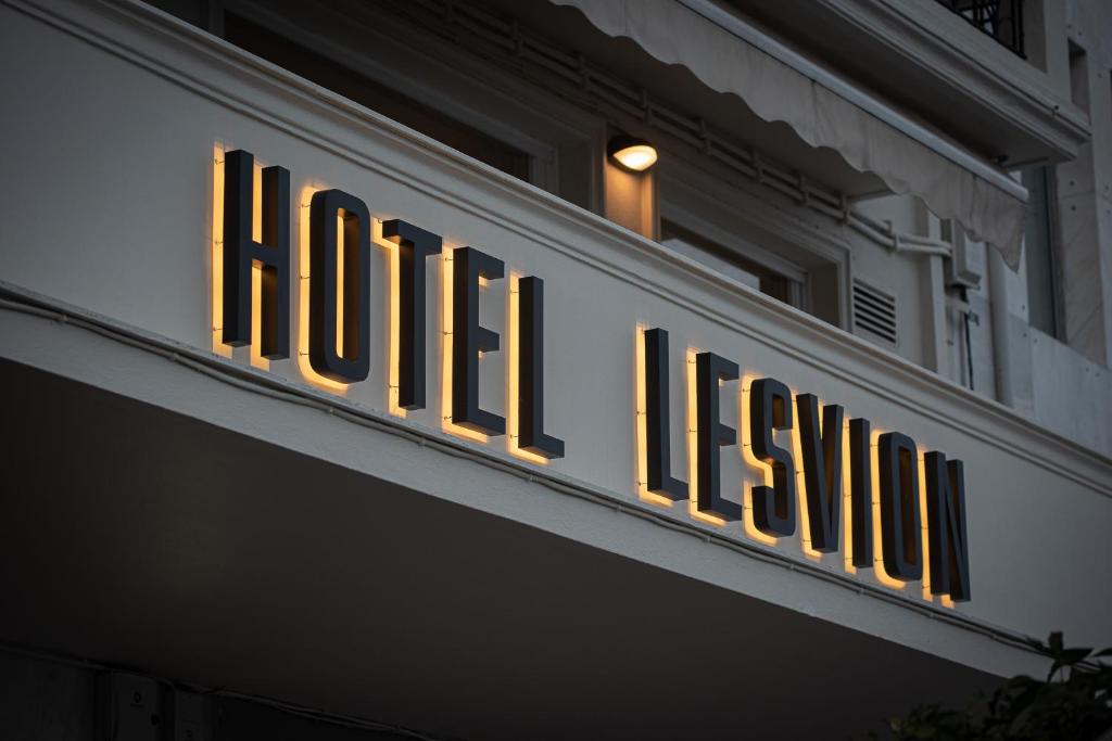 a sign for the hollywood sign on the side of a building at Lesvion Hotel in Mytilene