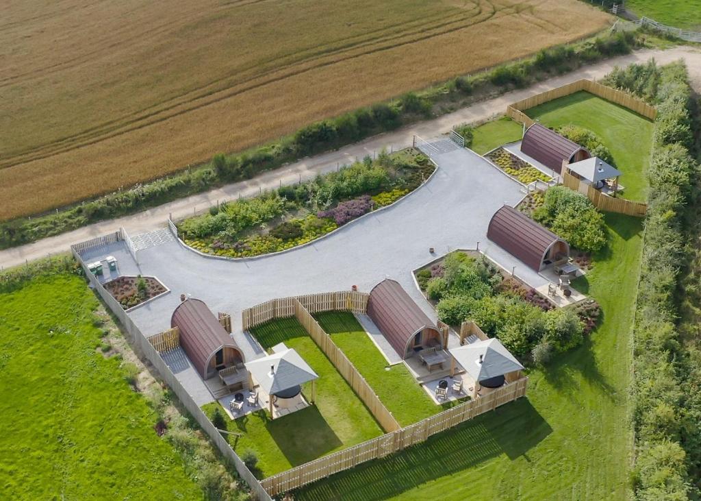 an aerial view of a house with a garden at Hillside Havens in Dufftown