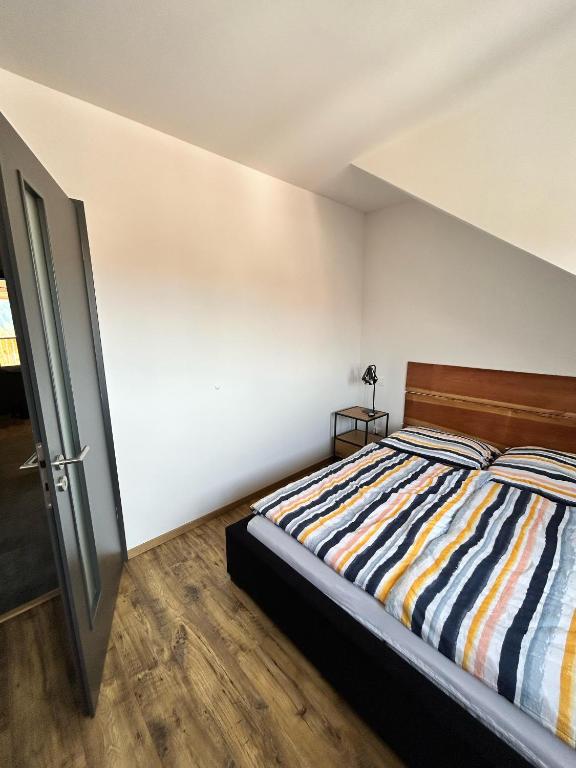 Postel nebo postele na pokoji v ubytování Apartmán Mavis