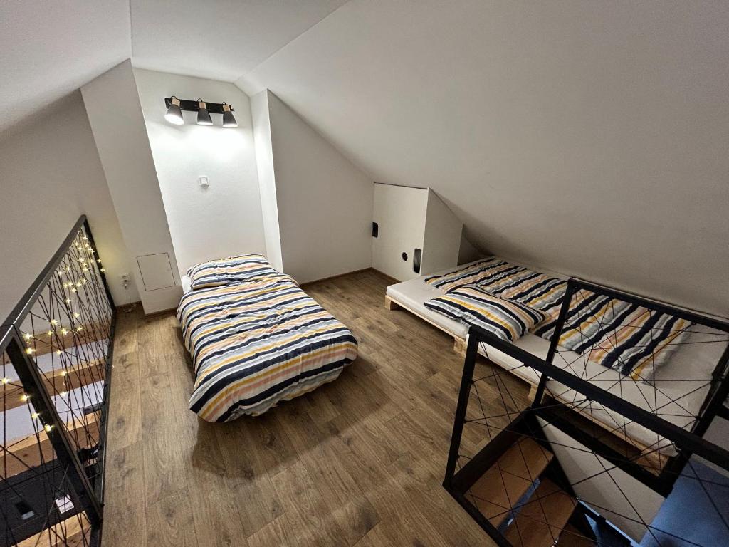 Postel nebo postele na pokoji v ubytování Apartmán Mavis