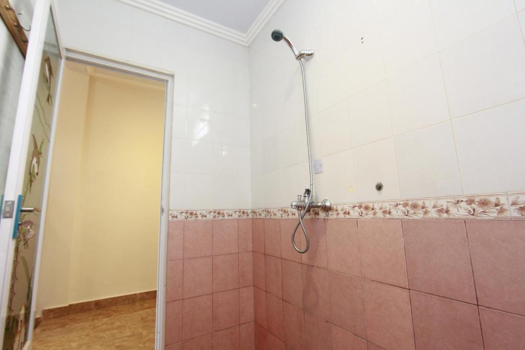 Koupelna v ubytování Baba Homestay