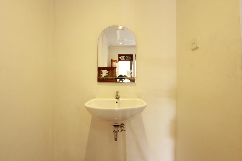 Koupelna v ubytování Baba Homestay