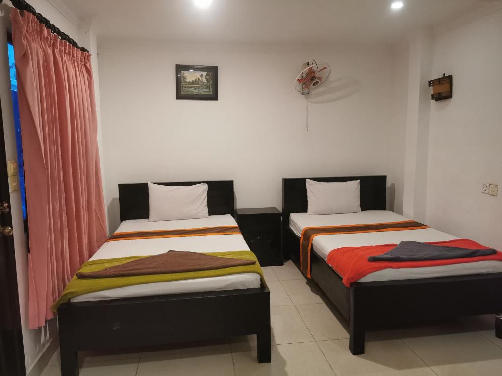 Postel nebo postele na pokoji v ubytování CENTRAL BACKPACKER