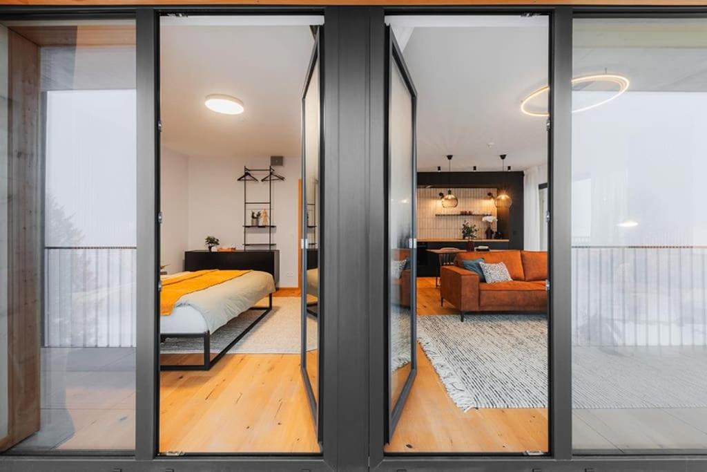Postel nebo postele na pokoji v ubytování DeLuxe apartmán s terasou Janské Lázně 3 Ski&Bike by AlkaTravel