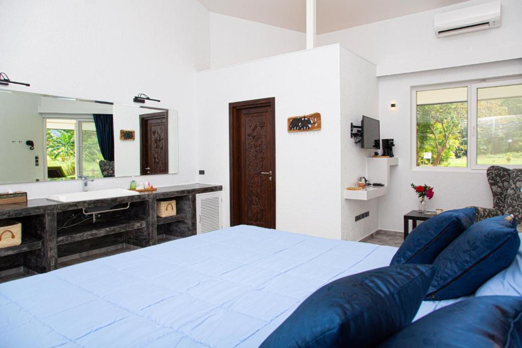 Postel nebo postele na pokoji v ubytování Villa Manao - Koh Chang