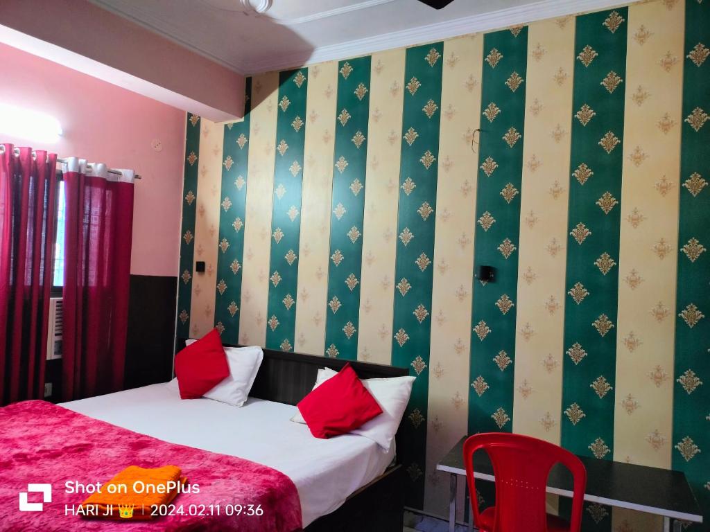 Krevet ili kreveti u jedinici u okviru objekta Hotel Shri Hari Residency