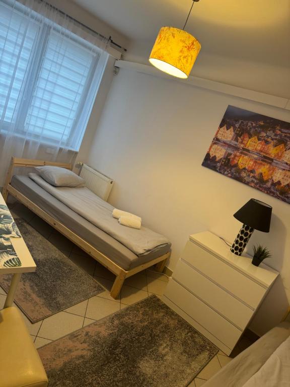 Postel nebo postele na pokoji v ubytování ESA Home