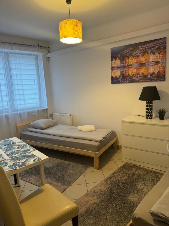 Postel nebo postele na pokoji v ubytování ESA Home