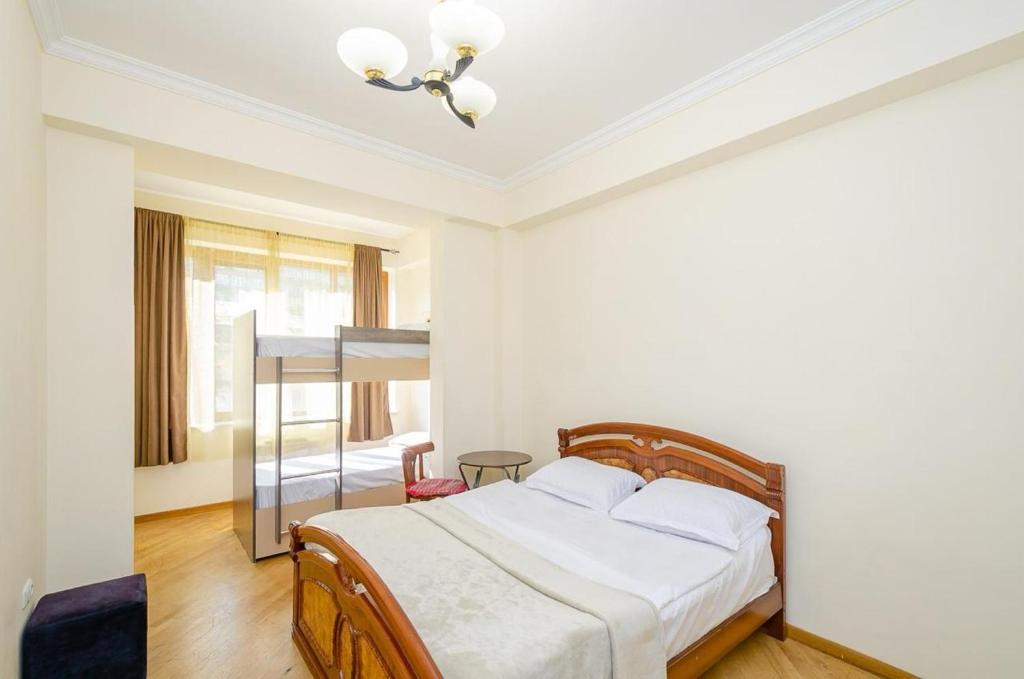 Postel nebo postele na pokoji v ubytování Areva Hostel & Apartment