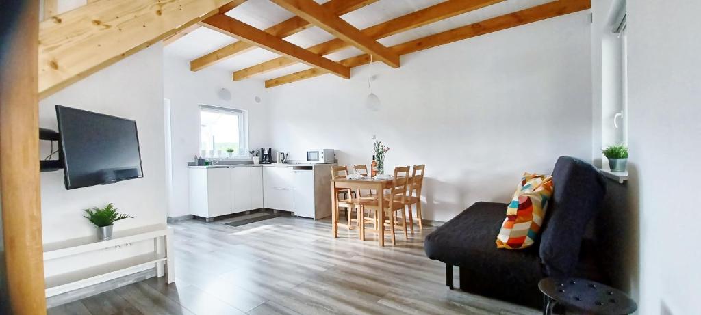 Kuchyň nebo kuchyňský kout v ubytování Domki 7 Houses Rewal
