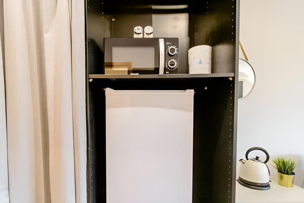 Kuchyň nebo kuchyňský kout v ubytování Komfortables Doppelzimmer in Kehl Goldscheuer - 1A Guesthouse