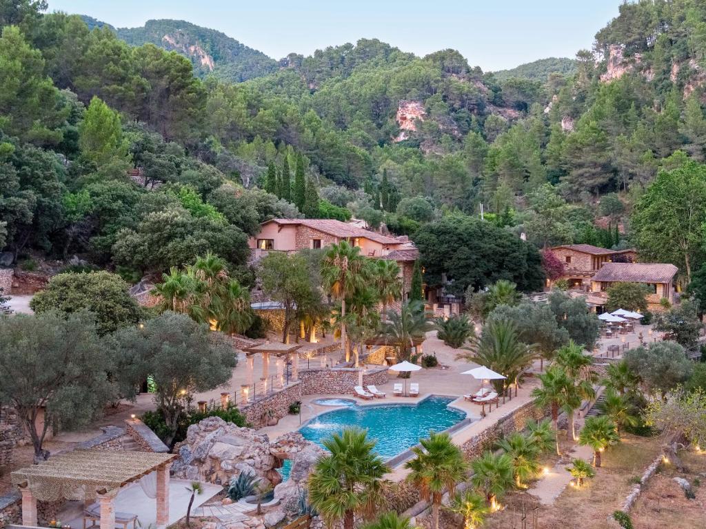 an aerial view of a resort with a swimming pool at Ratxó Retreat Hotel, member of Meliá Collection in Puigpunyent