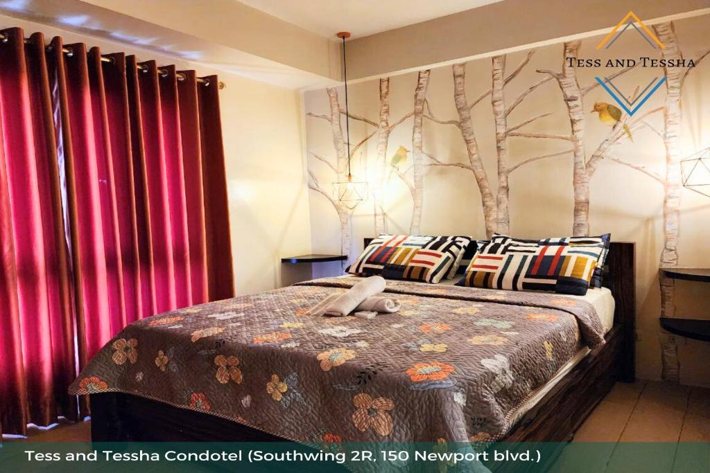Cama o camas de una habitación en Tess and Tessha Condotel near T3 Airport