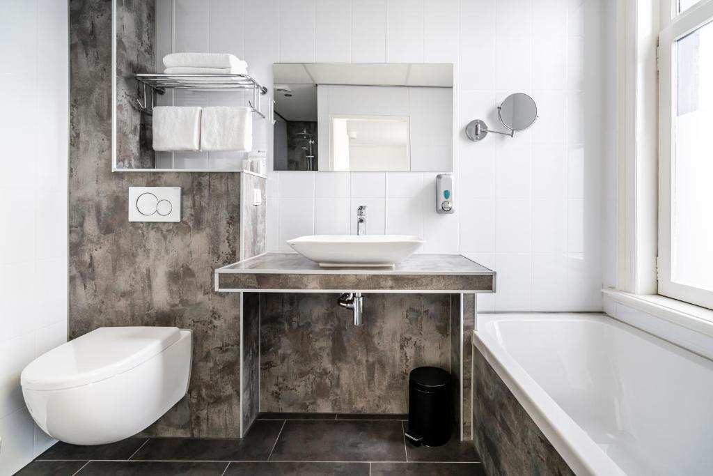 Koupelna v ubytování Hotel Hulst