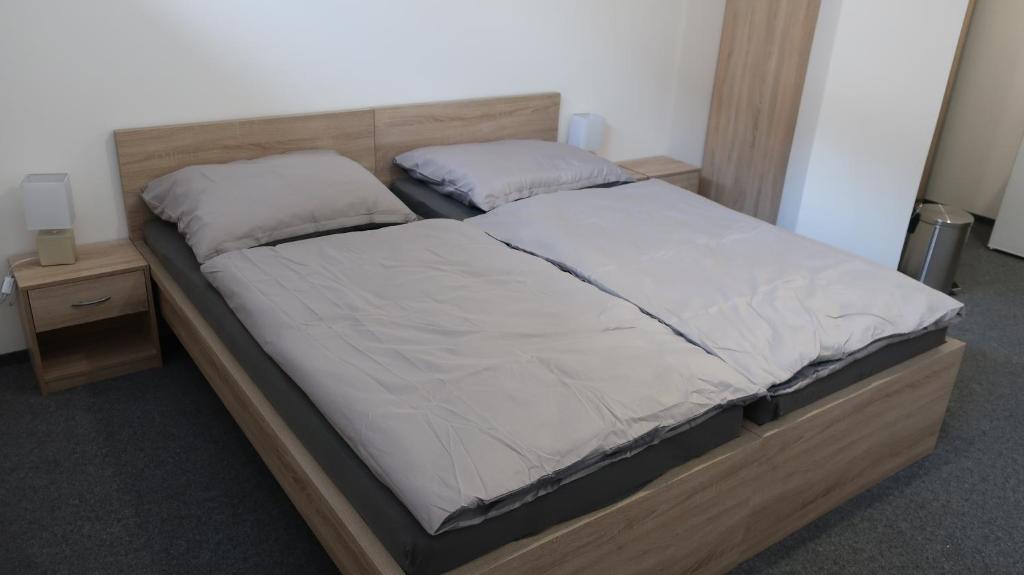 Postel nebo postele na pokoji v ubytování Penzion Fiesta