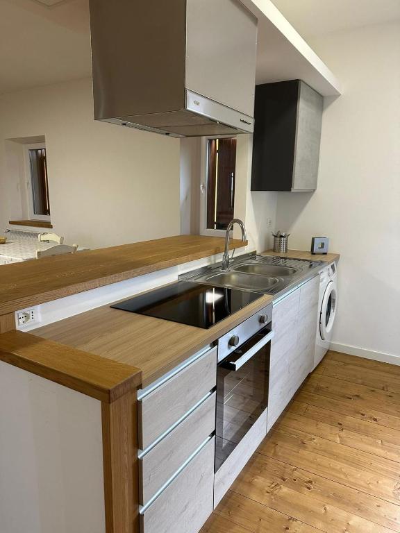 A kitchen or kitchenette at La corte dell'ulivo