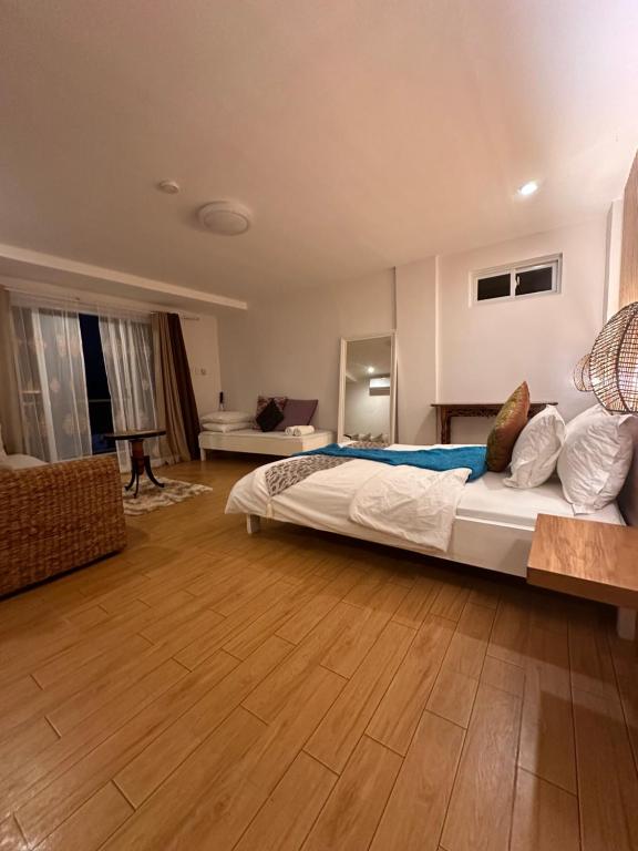 Postel nebo postele na pokoji v ubytování CasaDel Beach House