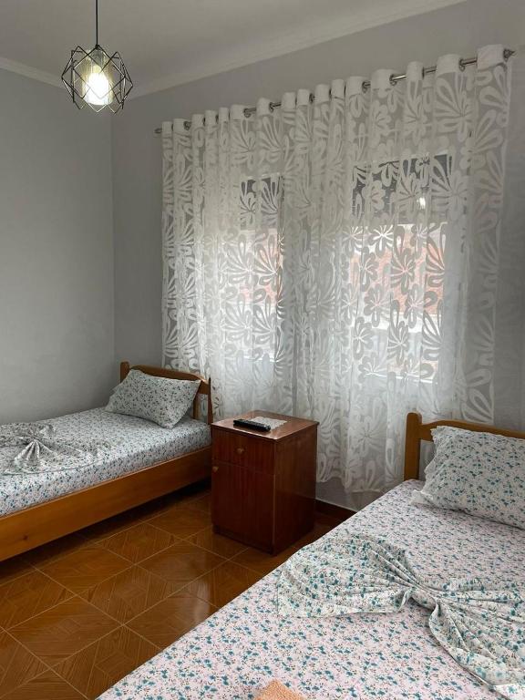 Postel nebo postele na pokoji v ubytování Eiffel's Guest House
