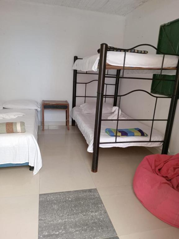 Postel nebo postele na pokoji v ubytování Finca posada del camino real