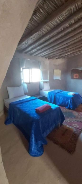 Postel nebo postele na pokoji v ubytování ecolodge bivouac des aigles
