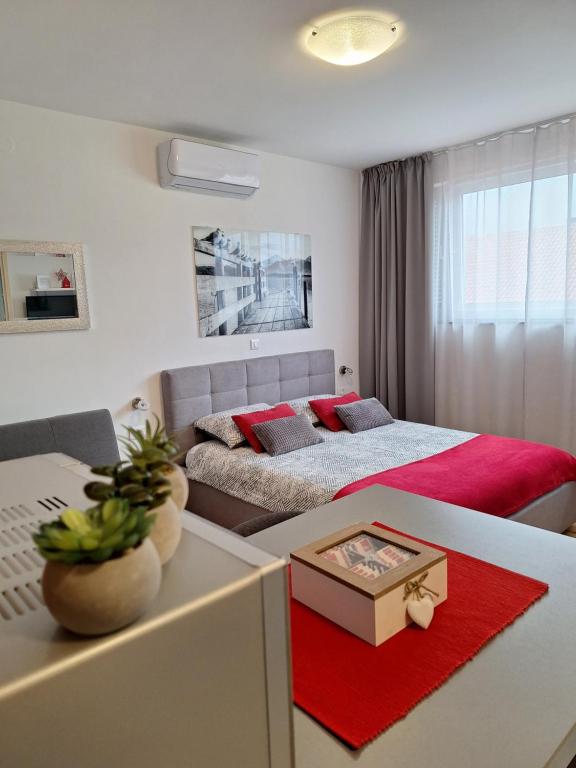 Posteľ alebo postele v izbe v ubytovaní Apartment LEA MARIA