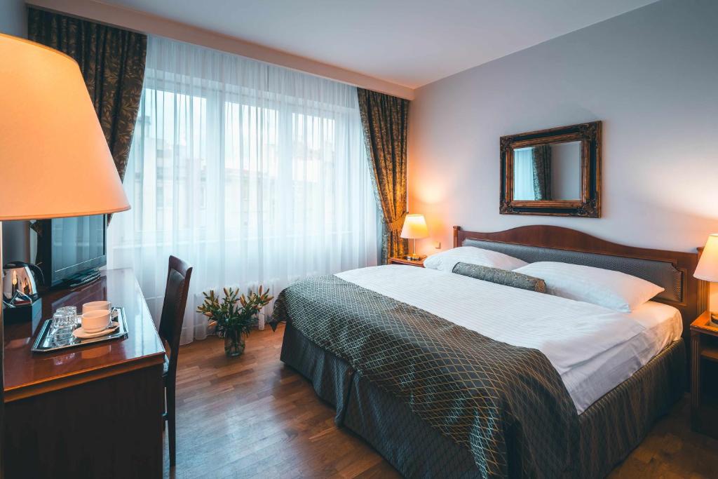 Postel nebo postele na pokoji v ubytování Belvedere